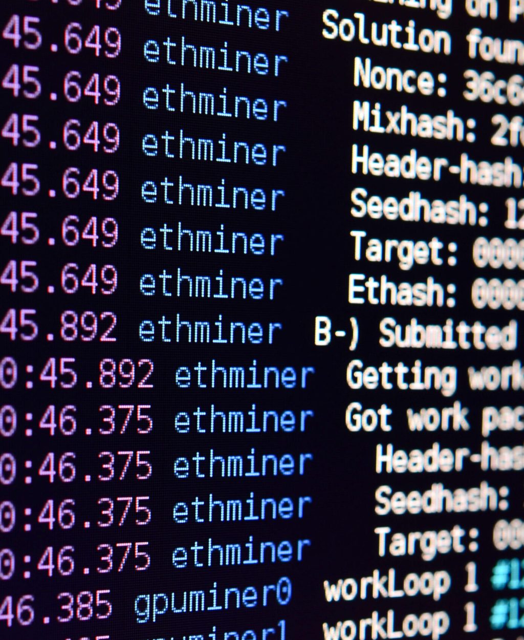 Macro snapshot of the program interface for crypto currency mining on the monitor of an office computer. The concept of mining bitcoins. The flow of information strings and data